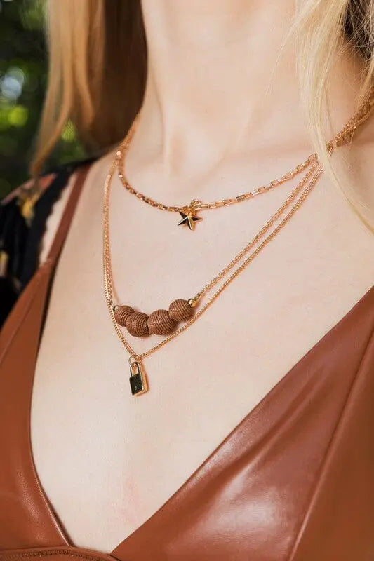 Three Layered Rustic Gold Charmed Necklace three layered rustic necklace Poet Street Boutique